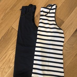 Two gorgeous tanks with leather scallop